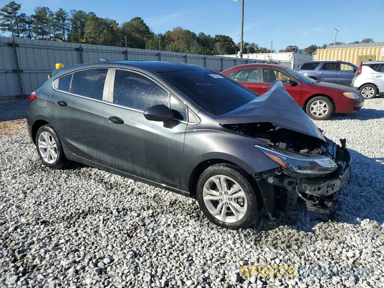 4 fotografías del automóvil dañado 3G1BE6SM9KS545650 CHEVROLET CRUZE 2019
