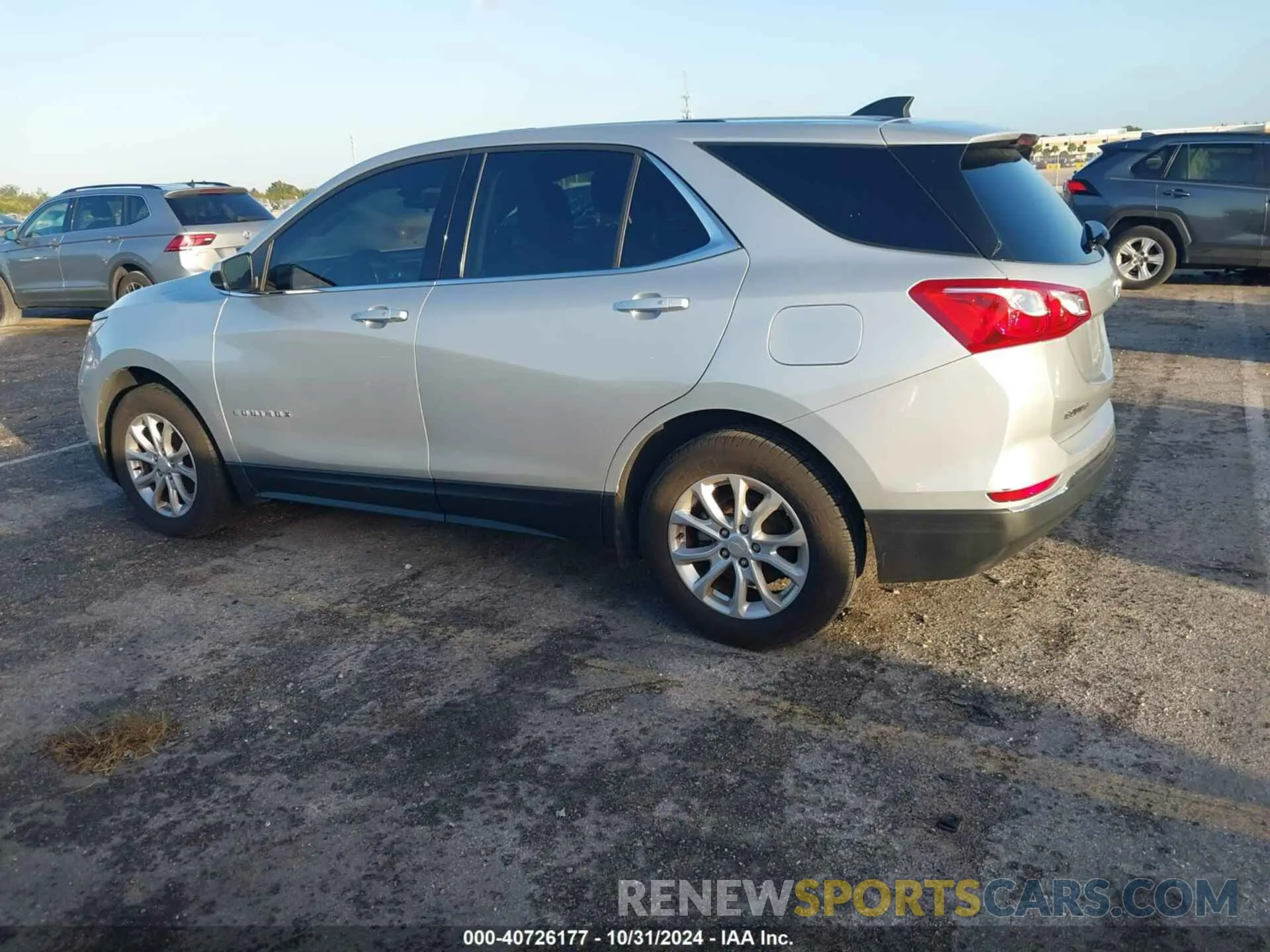 3 fotografías del automóvil dañado 2GNAXKEVXK6102276 CHEVROLET EQUINOX 2019