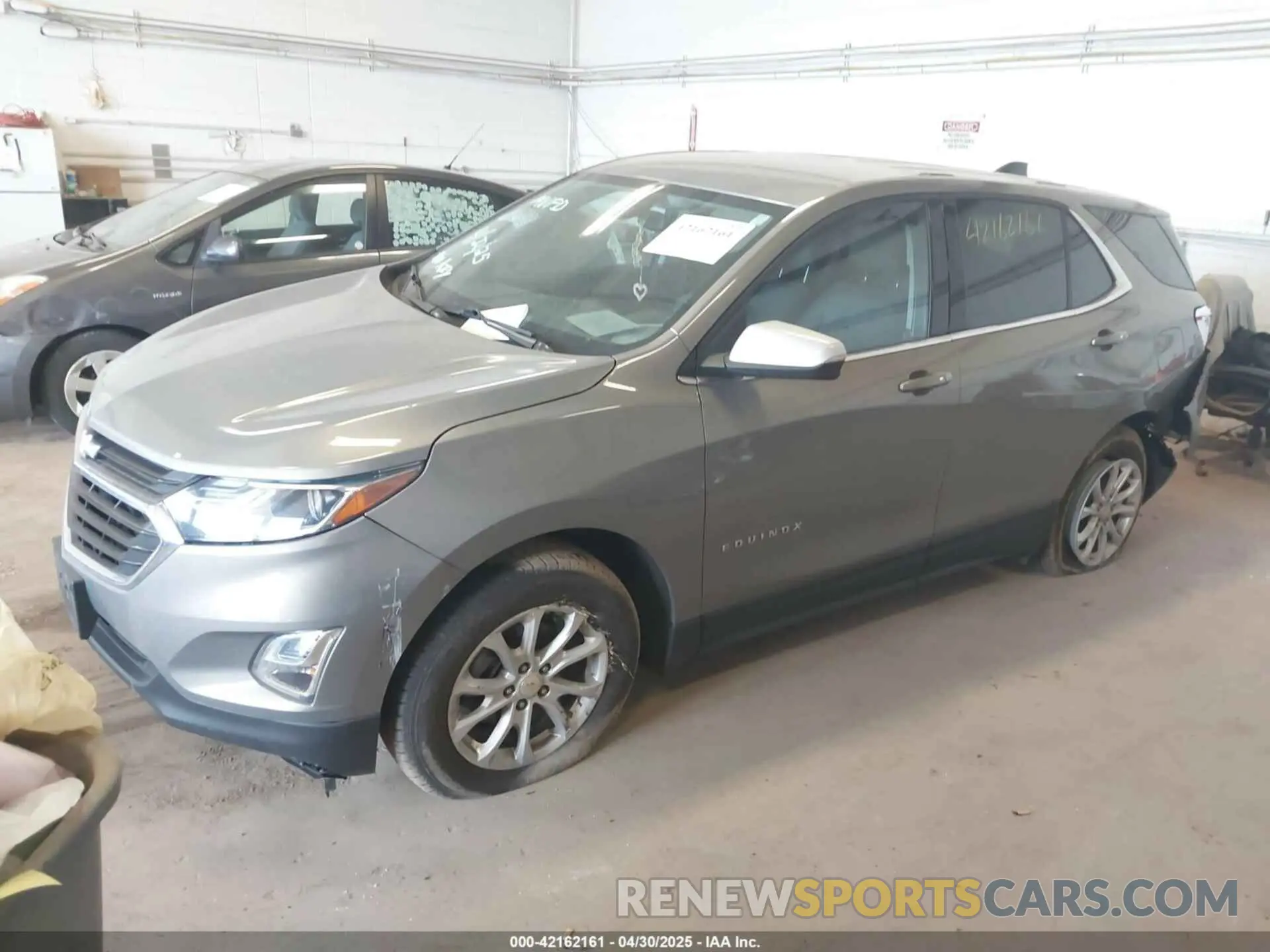 2 fotografías del automóvil dañado 3GNAXUEV1KS516124 CHEVROLET EQUINOX 2019