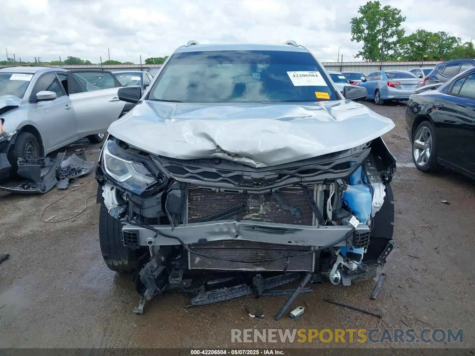 6 fotografías del automóvil dañado 2GNAXNEV4M6122656 CHEVROLET EQUINOX 2021