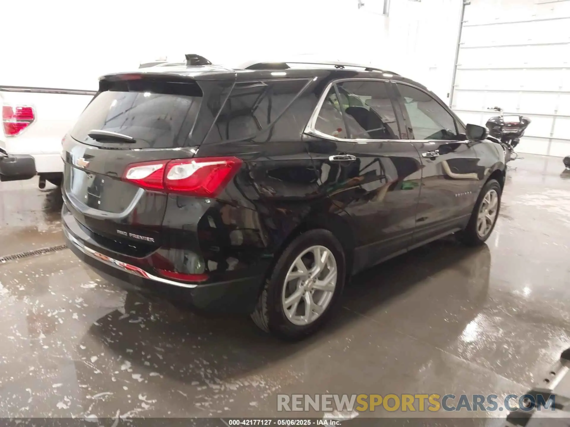 4 fotografías del automóvil dañado 2GNAXXEV4M6144961 CHEVROLET EQUINOX 2021