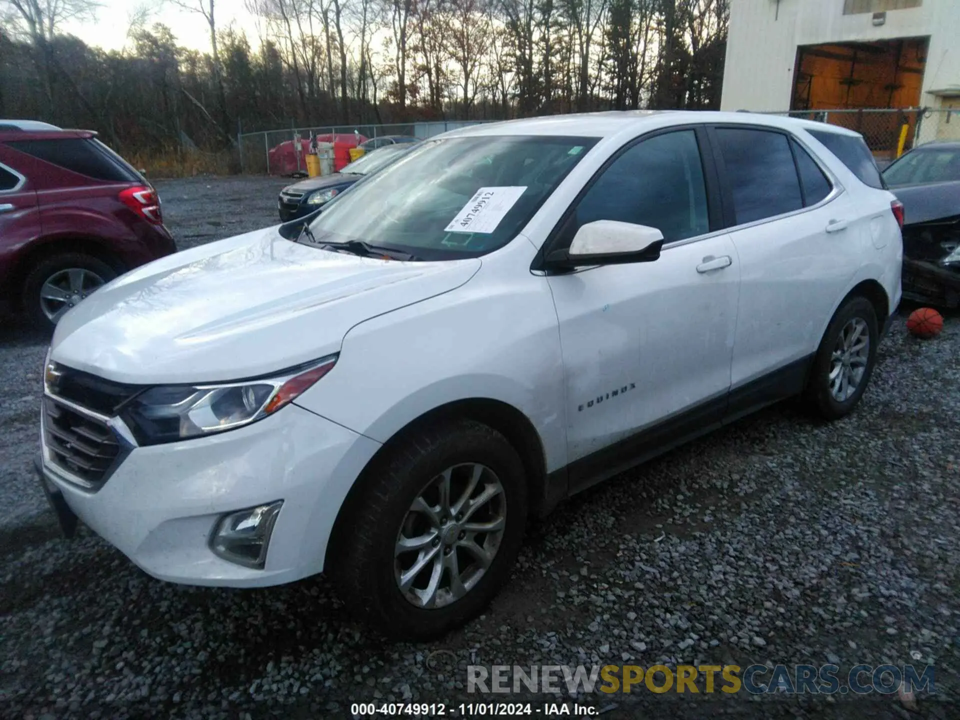 2 fotografías del automóvil dañado 3GNAXUEV0MS136453 CHEVROLET EQUINOX 2021