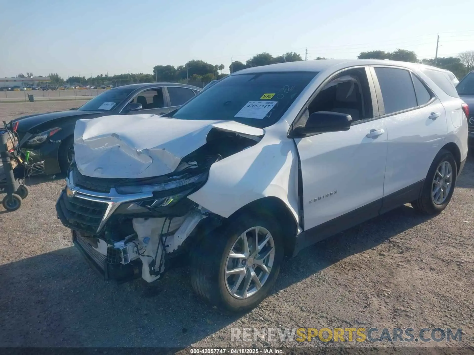 2 fotografías del automóvil dañado 3GNAXHEG5PL273072 CHEVROLET EQUINOX 2023