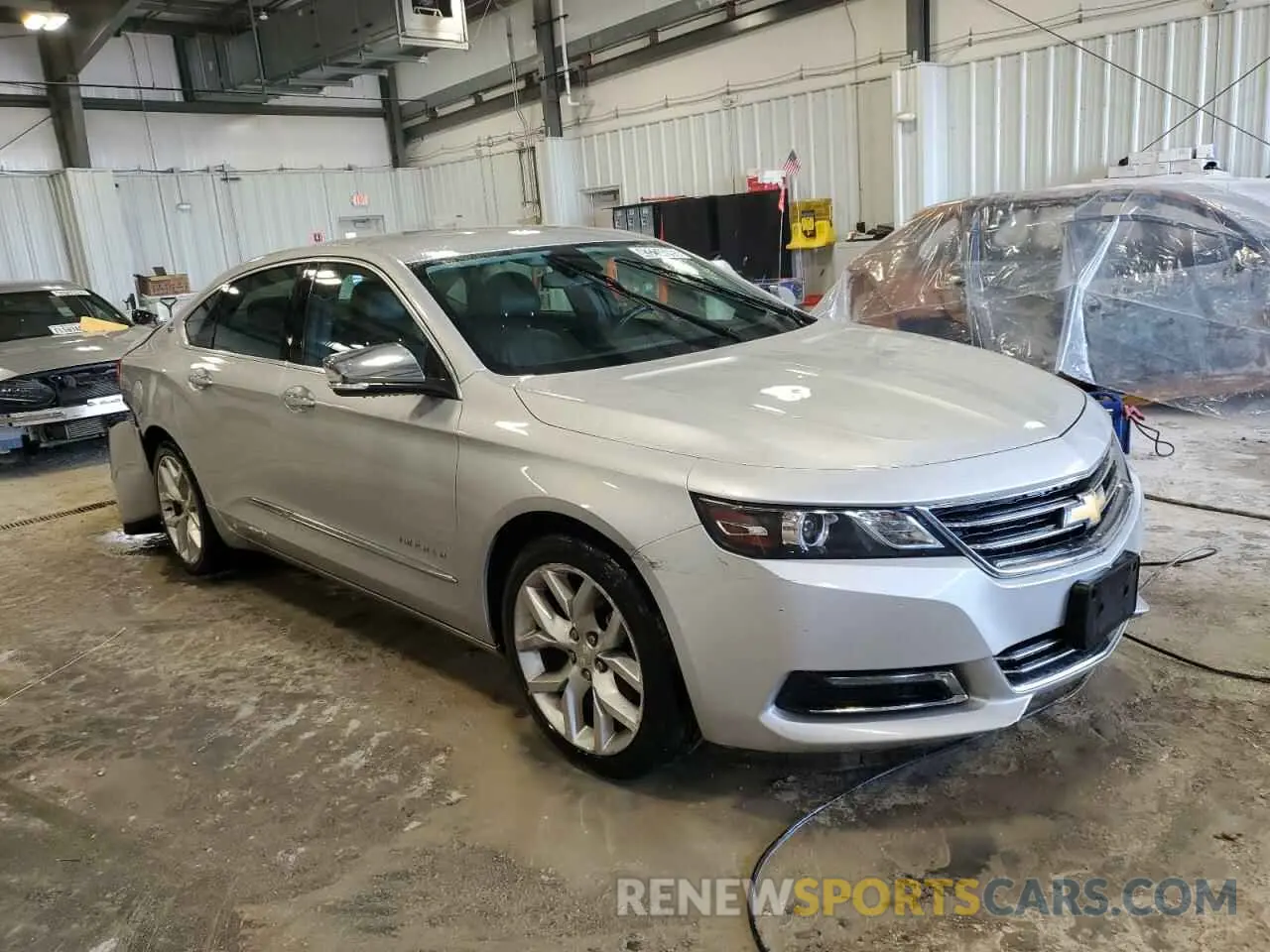 4 fotografías del automóvil dañado 1G1105S37KU141435 CHEVROLET IMPALA 2019
