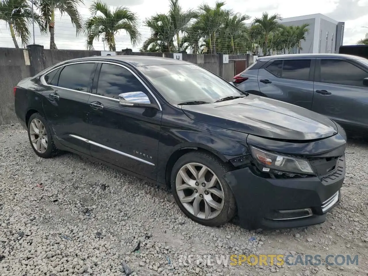 4 fotografías del automóvil dañado 1G1105S3XKU116769 CHEVROLET IMPALA 2019
