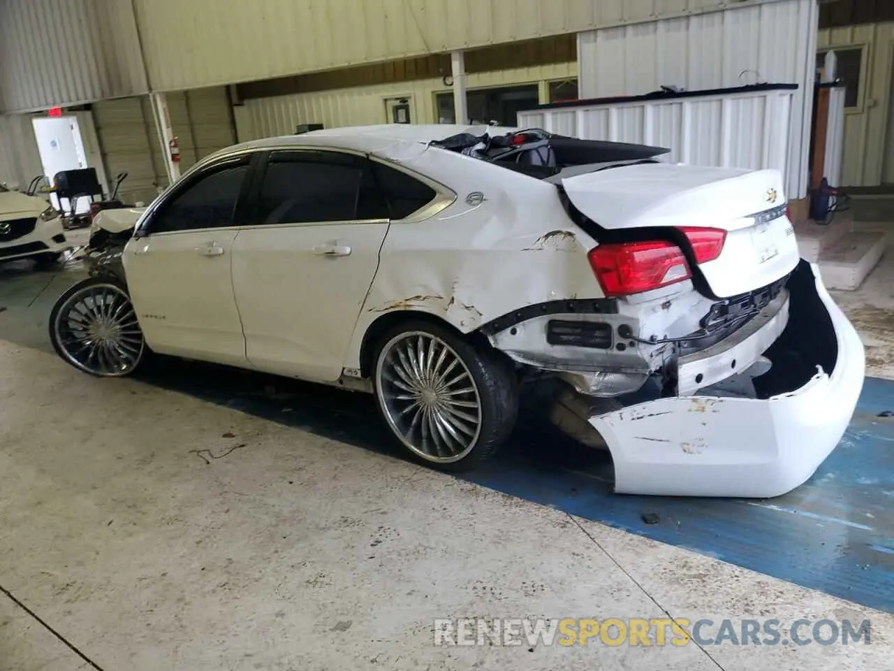 2 fotografías del automóvil dañado 1G11Z5SA5KU136139 CHEVROLET IMPALA 2019