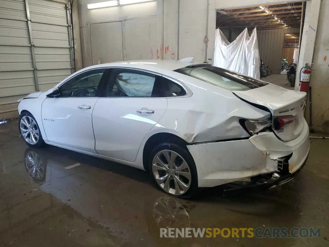 2 fotografías del automóvil dañado 1G1ZE5SX6KF213074 CHEVROLET MALIBU 2019