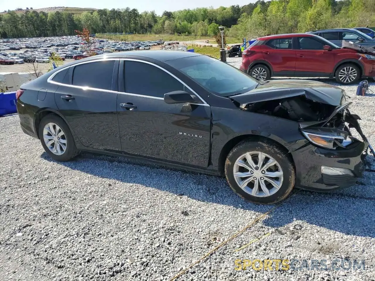 4 fotografías del automóvil dañado 1G1ZD5STXLF112802 CHEVROLET MALIBU 2020