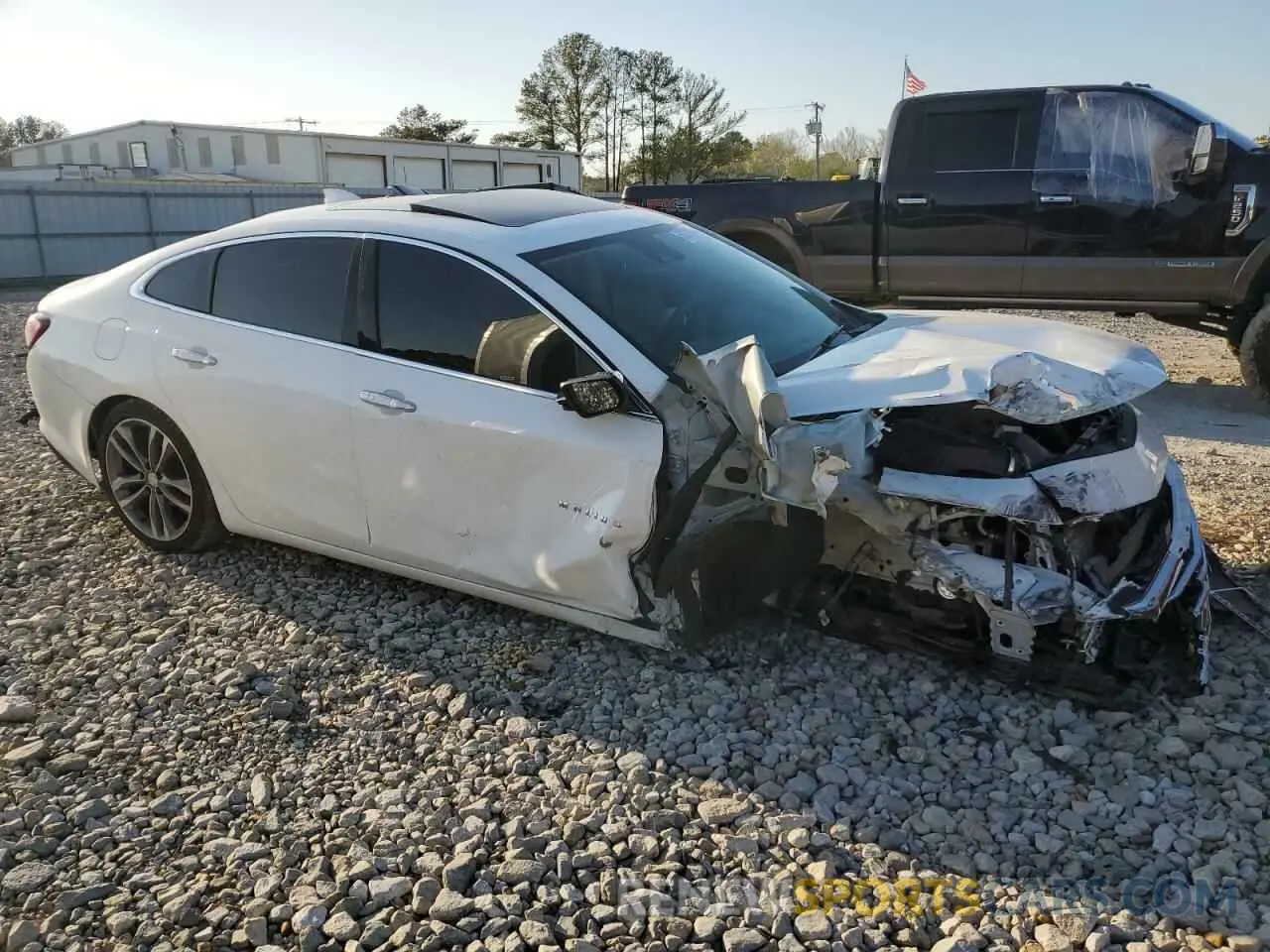 4 fotografías del automóvil dañado 1G1ZE5SX3LF114066 CHEVROLET MALIBU 2020