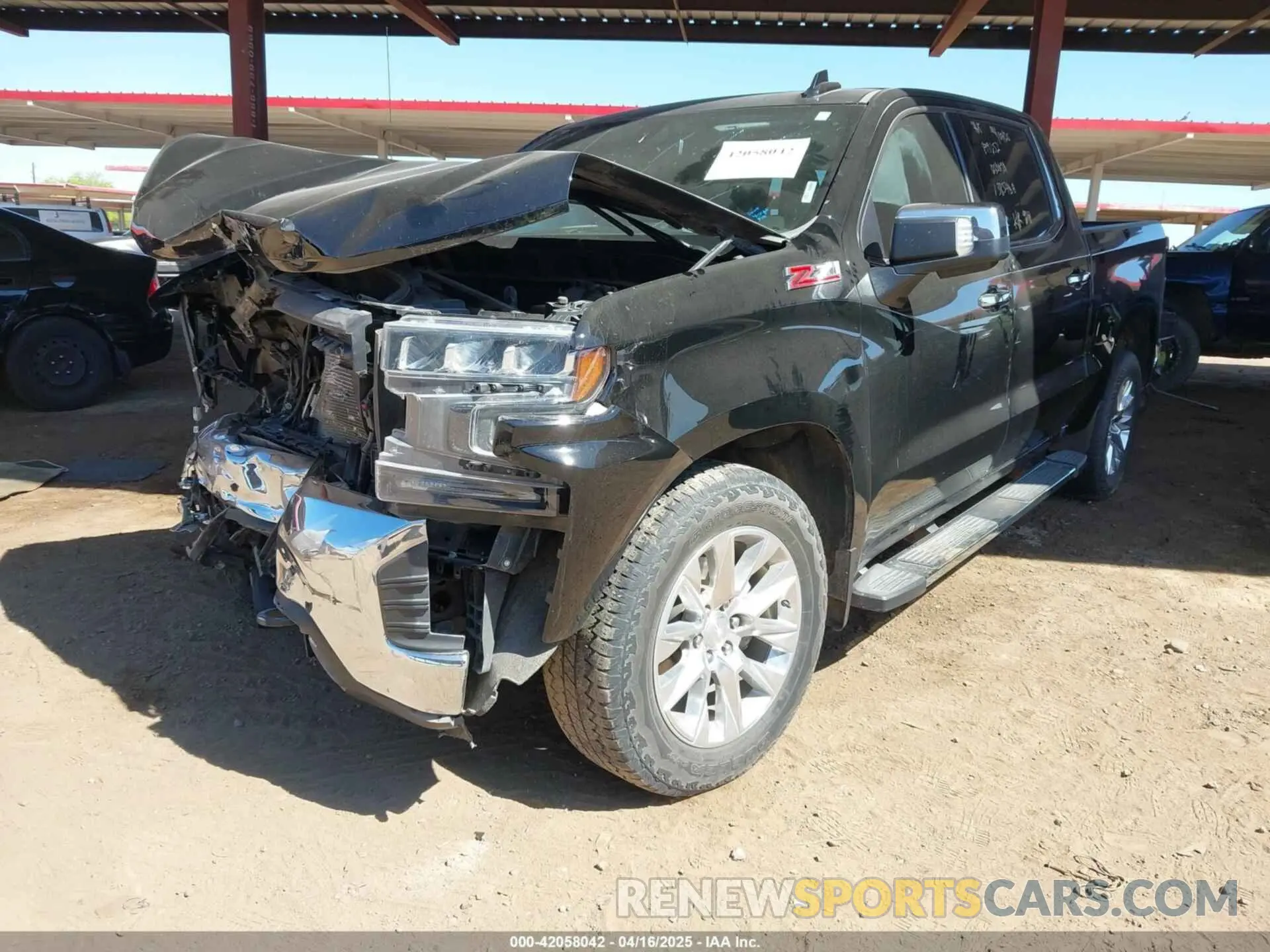 2 fotografías del automóvil dañado 3GCUYGEL4MG385408 CHEVROLET SILVERADO 1500 2021