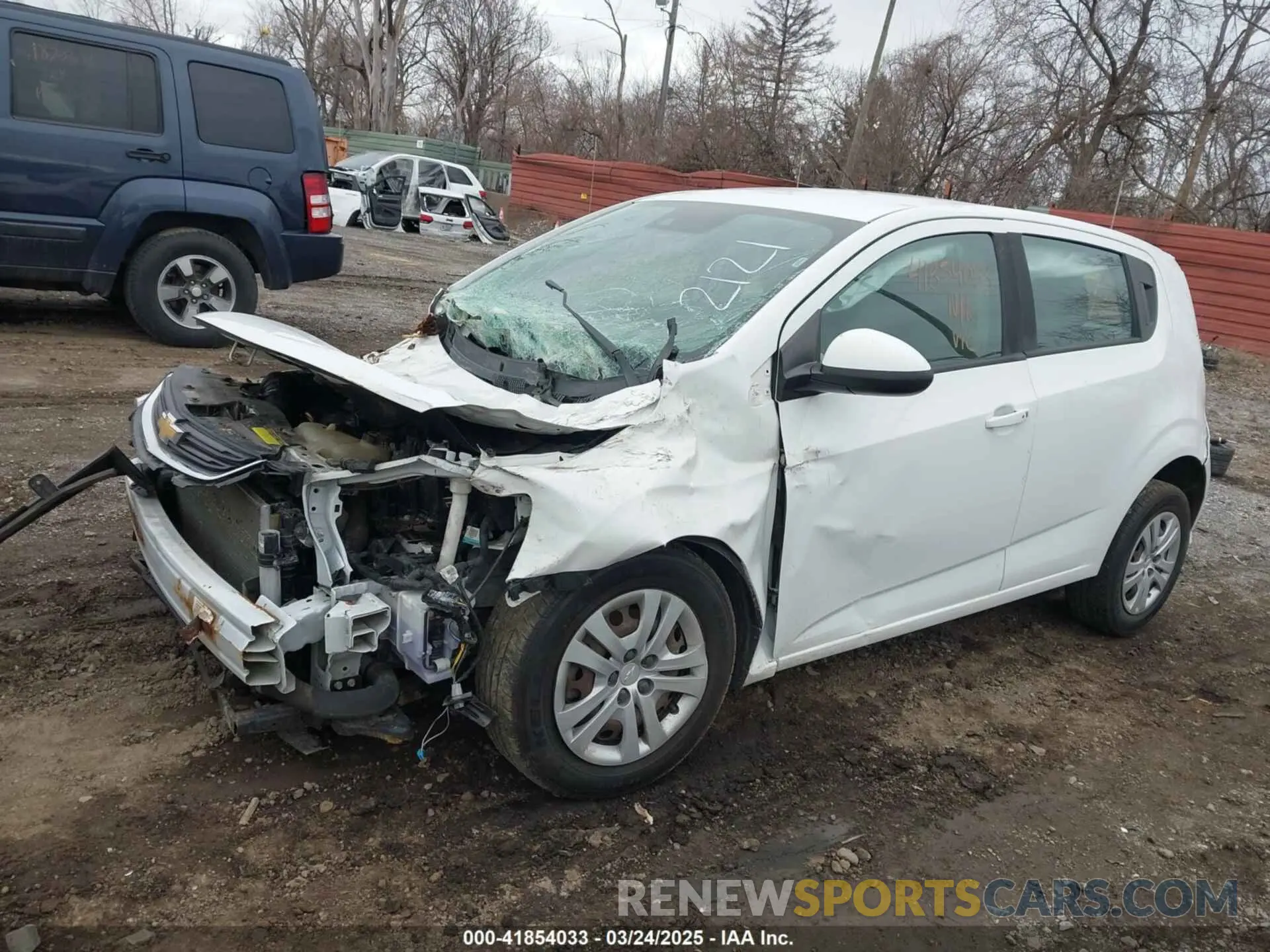 2 fotografías del automóvil dañado 1G1JG6SB9K4122121 CHEVROLET SONIC 2019