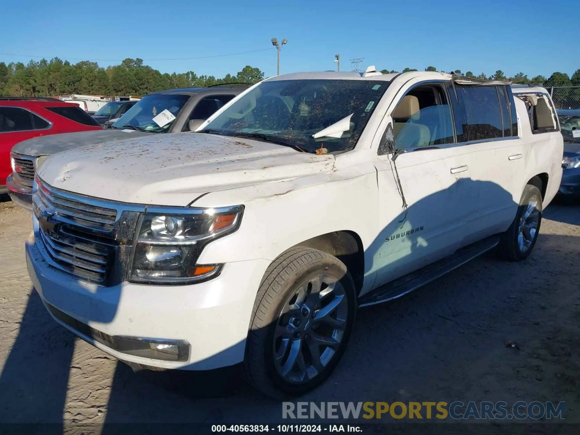 2 fotografías del automóvil dañado 1GNSCJKC0KR293658 CHEVROLET SUBURBAN 2019