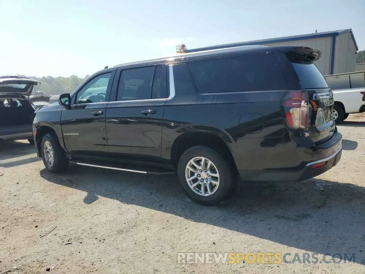 2 fotografías del automóvil dañado 1GNSCCKD1PR412085 CHEVROLET SUBURBAN 2023