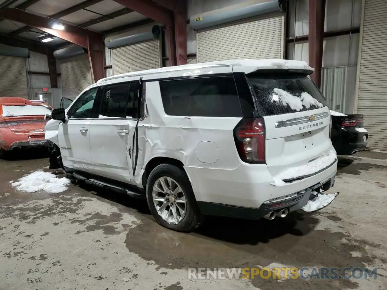 2 fotografías del automóvil dañado 1GNSCFKD7PR356185 CHEVROLET SUBURBAN 2023