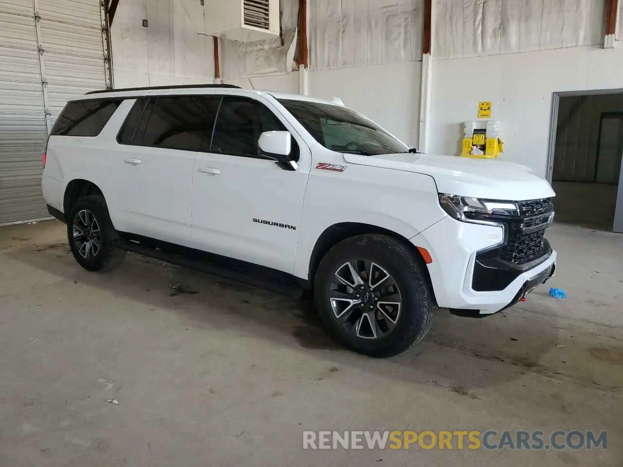 4 fotografías del automóvil dañado 1GNSKDKDXPR402129 CHEVROLET SUBURBAN 2023