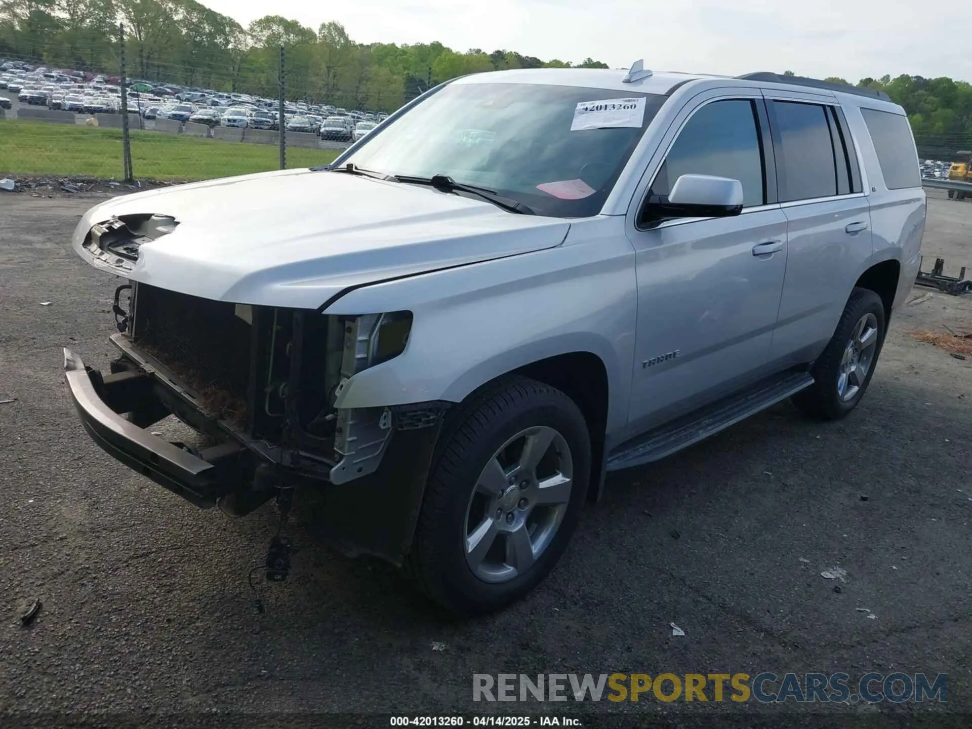 2 fotografías del automóvil dañado 1GNSCBKCXKR219413 CHEVROLET TAHOE 2019