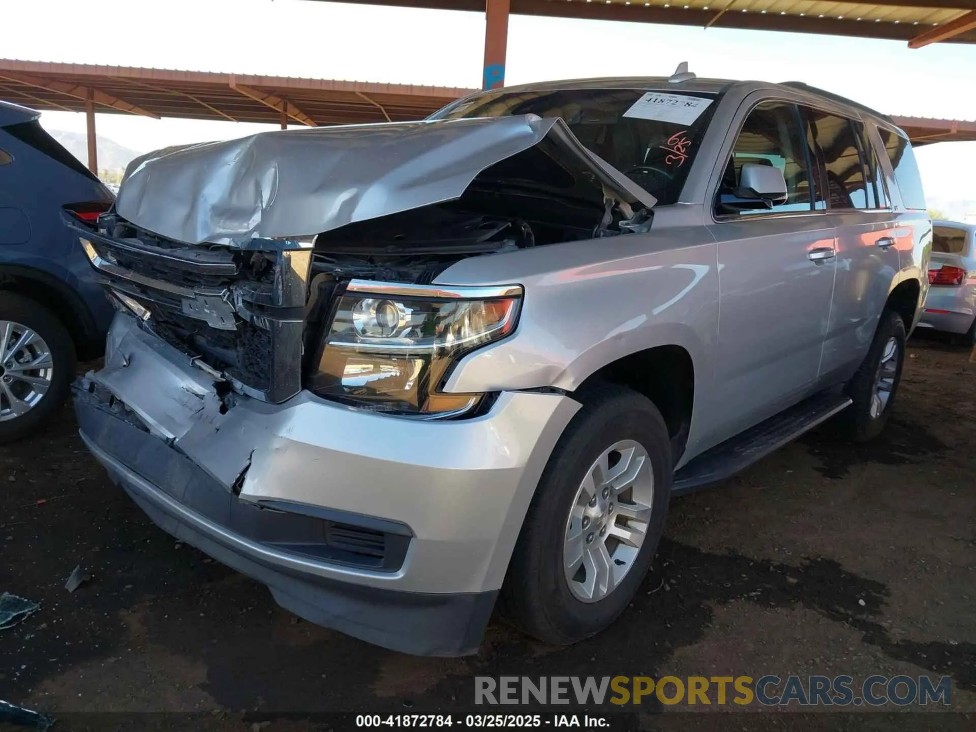 2 fotografías del automóvil dañado 1GNSKBKC6LR259394 CHEVROLET TAHOE 2020