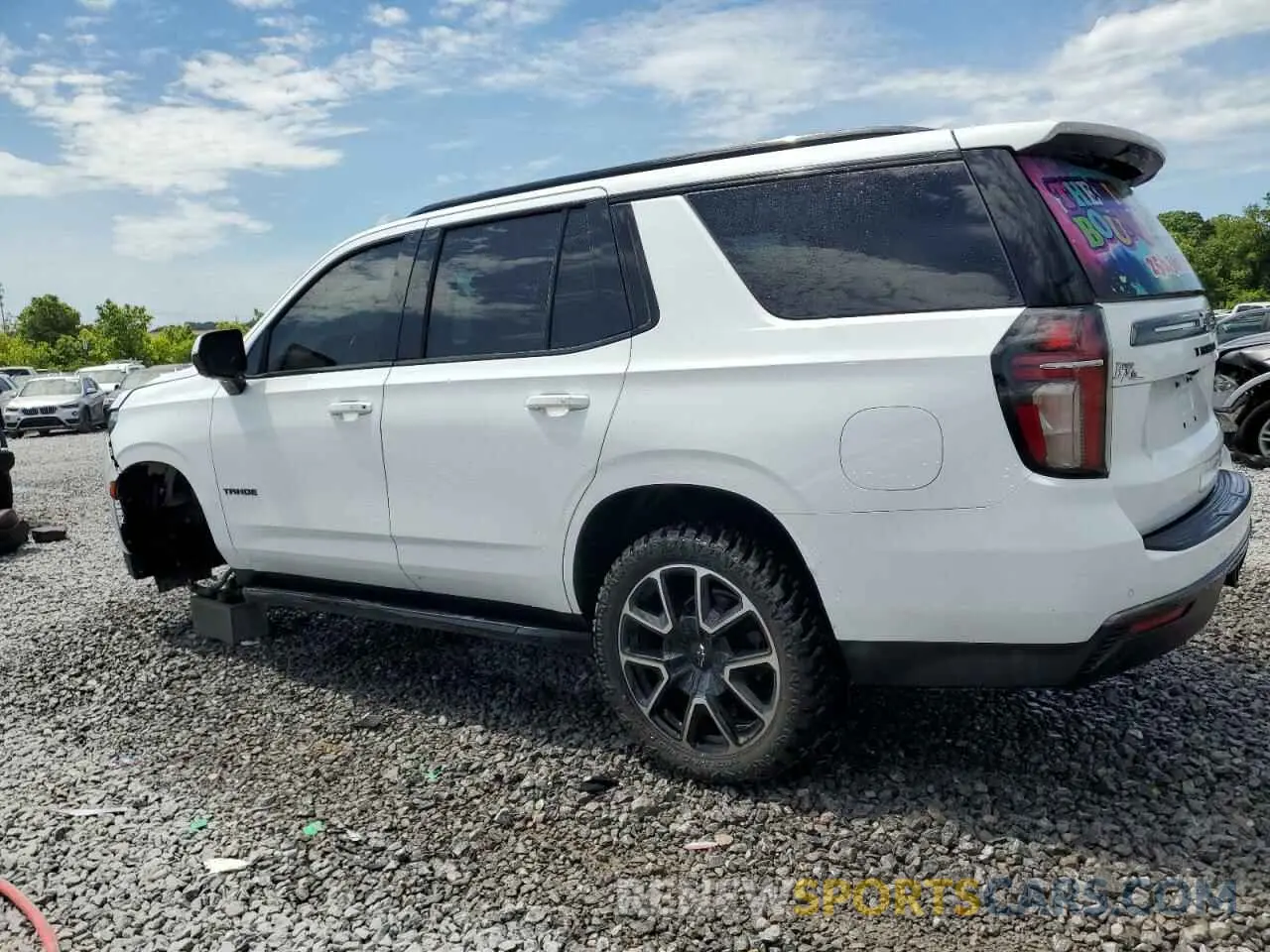 2 fotografías del automóvil dañado 1GNSCRKD9MR395972 CHEVROLET TAHOE 2021