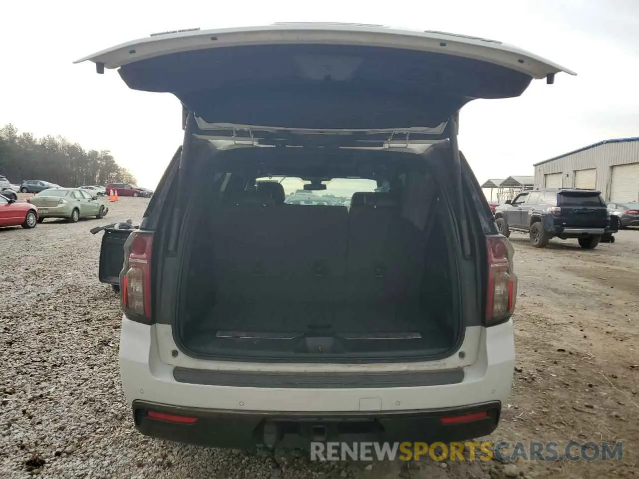 6 fotografías del automóvil dañado 1GNSCRKT5MR327806 CHEVROLET TAHOE 2021