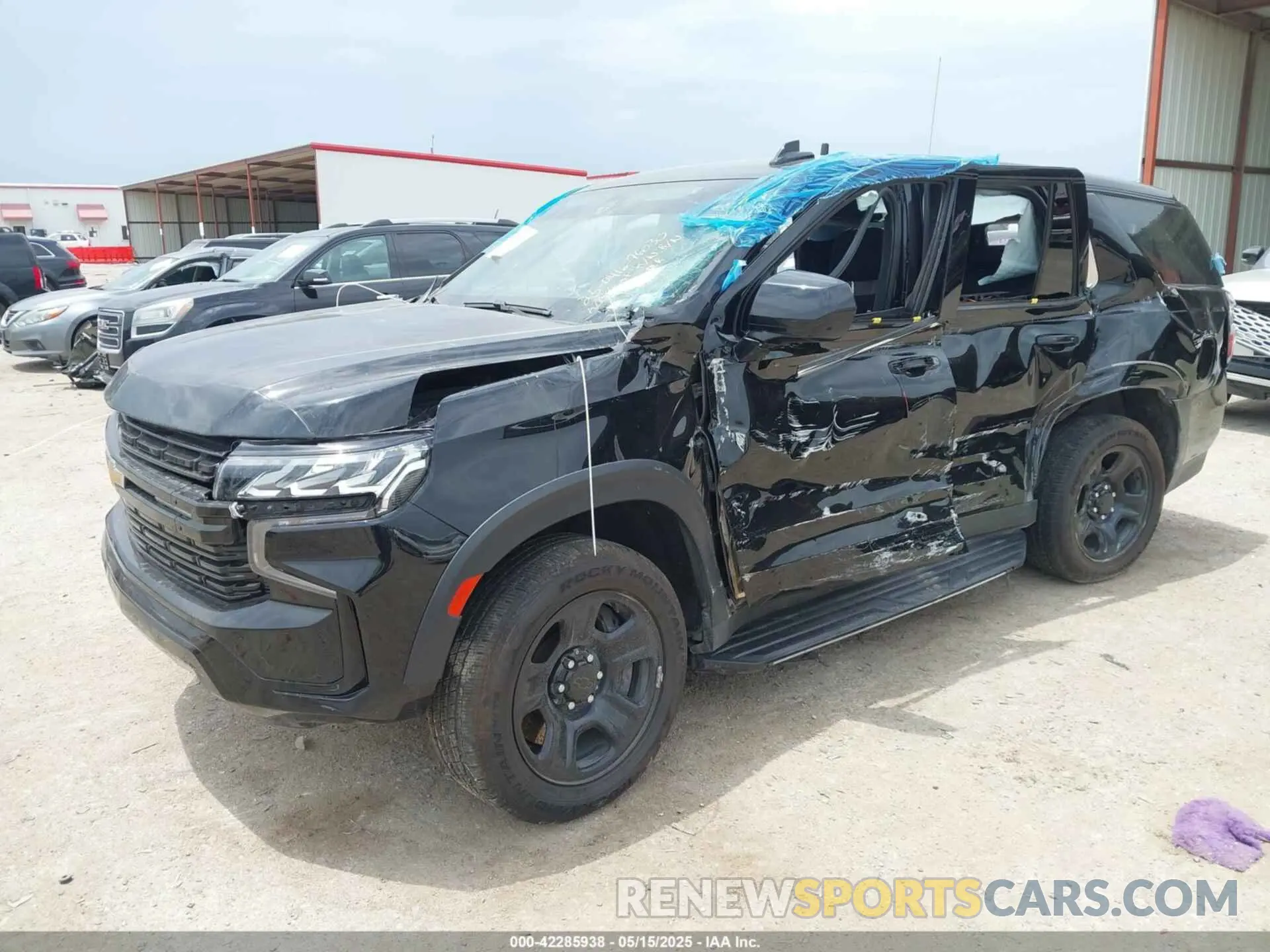 2 fotografías del automóvil dañado 1GNSCLED9NR313278 CHEVROLET TAHOE 2022
