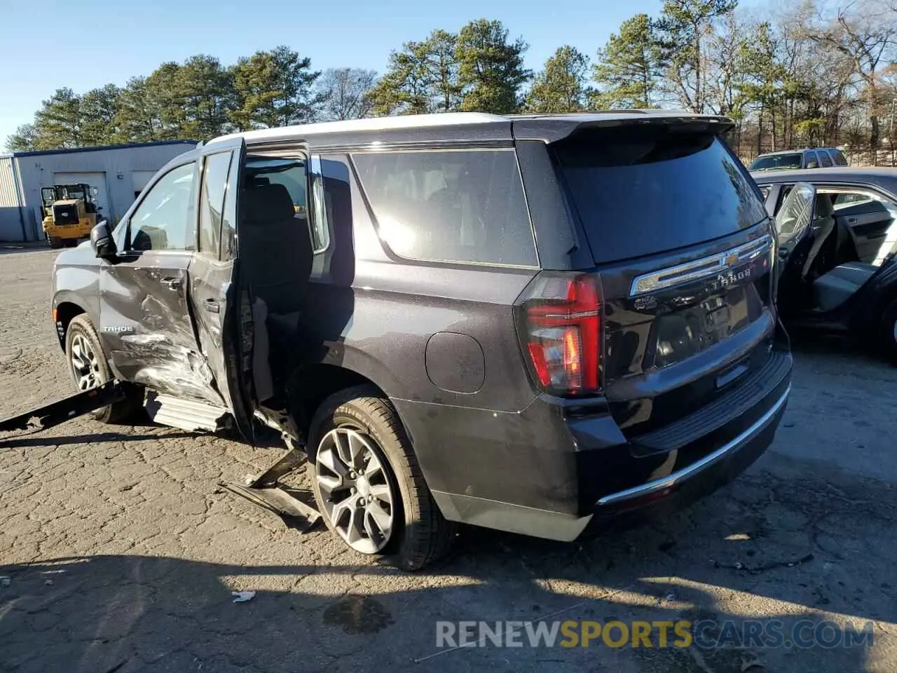 2 fotografías del automóvil dañado 1GNSKNKD2NR309561 CHEVROLET TAHOE 2022