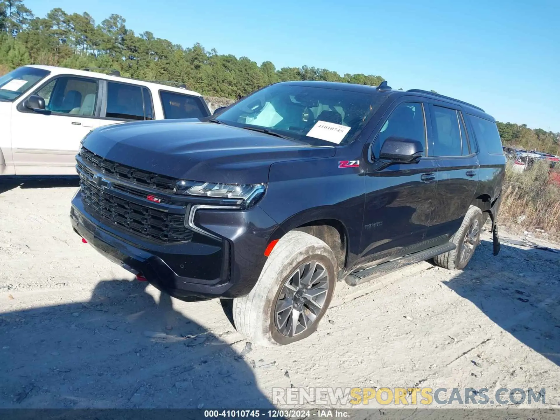 2 fotografías del automóvil dañado 1GNSKPKL7NR333664 CHEVROLET TAHOE 2022