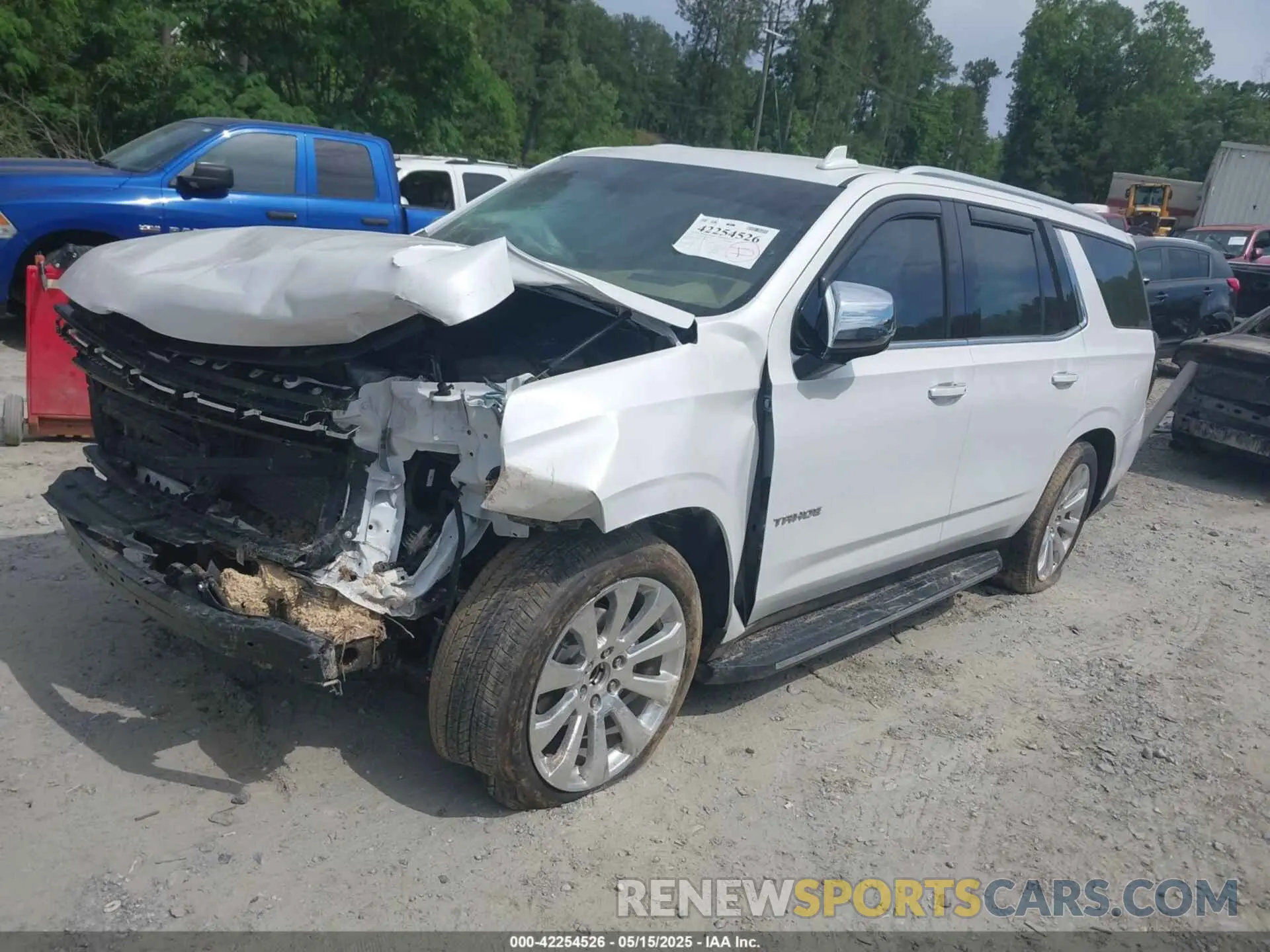 2 fotografías del automóvil dañado 1GNSCSKD9PR390234 CHEVROLET TAHOE 2023