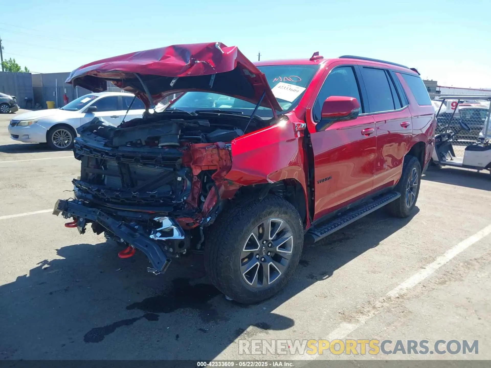 2 fotografías del automóvil dañado 1GNSKPKL1PR552686 CHEVROLET TAHOE 2023