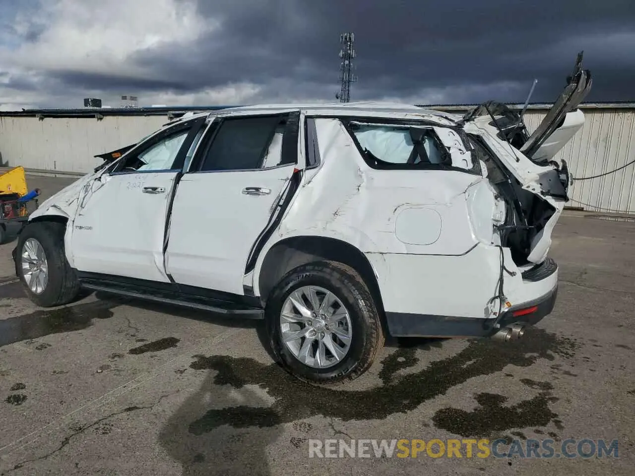 2 fotografías del automóvil dañado 1GNSKSKD8PR283310 CHEVROLET TAHOE 2023