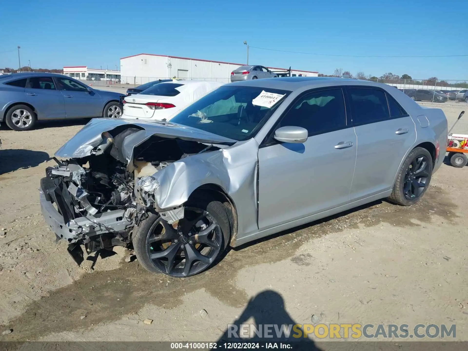 2 fotografías del automóvil dañado 2C3CCABG3NH178920 CHRYSLER 300 2022