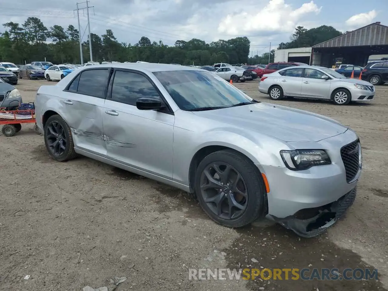 4 fotografías del automóvil dañado 2C3CCAAG1PH590001 CHRYSLER 300 2023