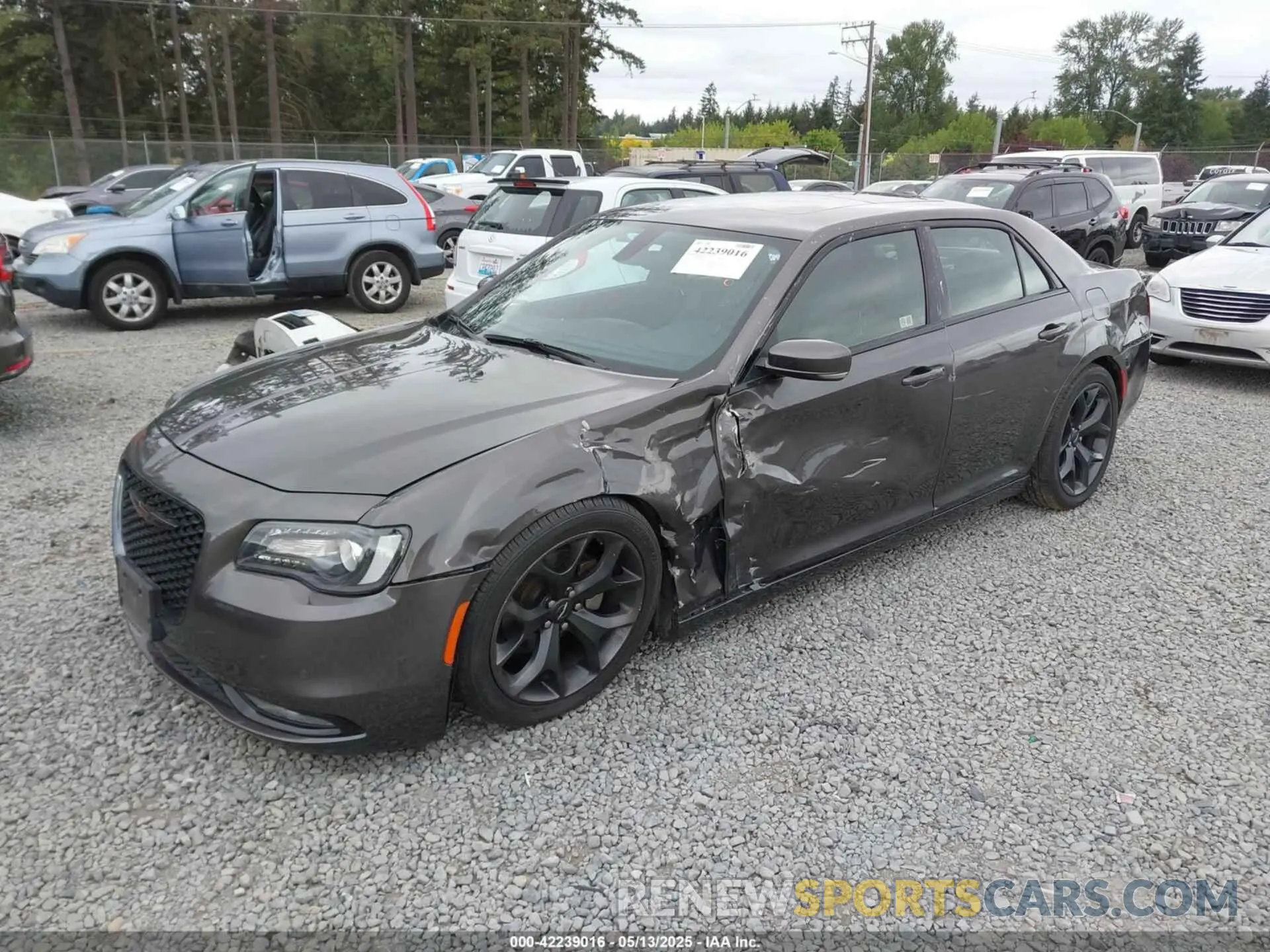 2 fotografías del automóvil dañado 2C3CCABG1PH561239 CHRYSLER 300 2023