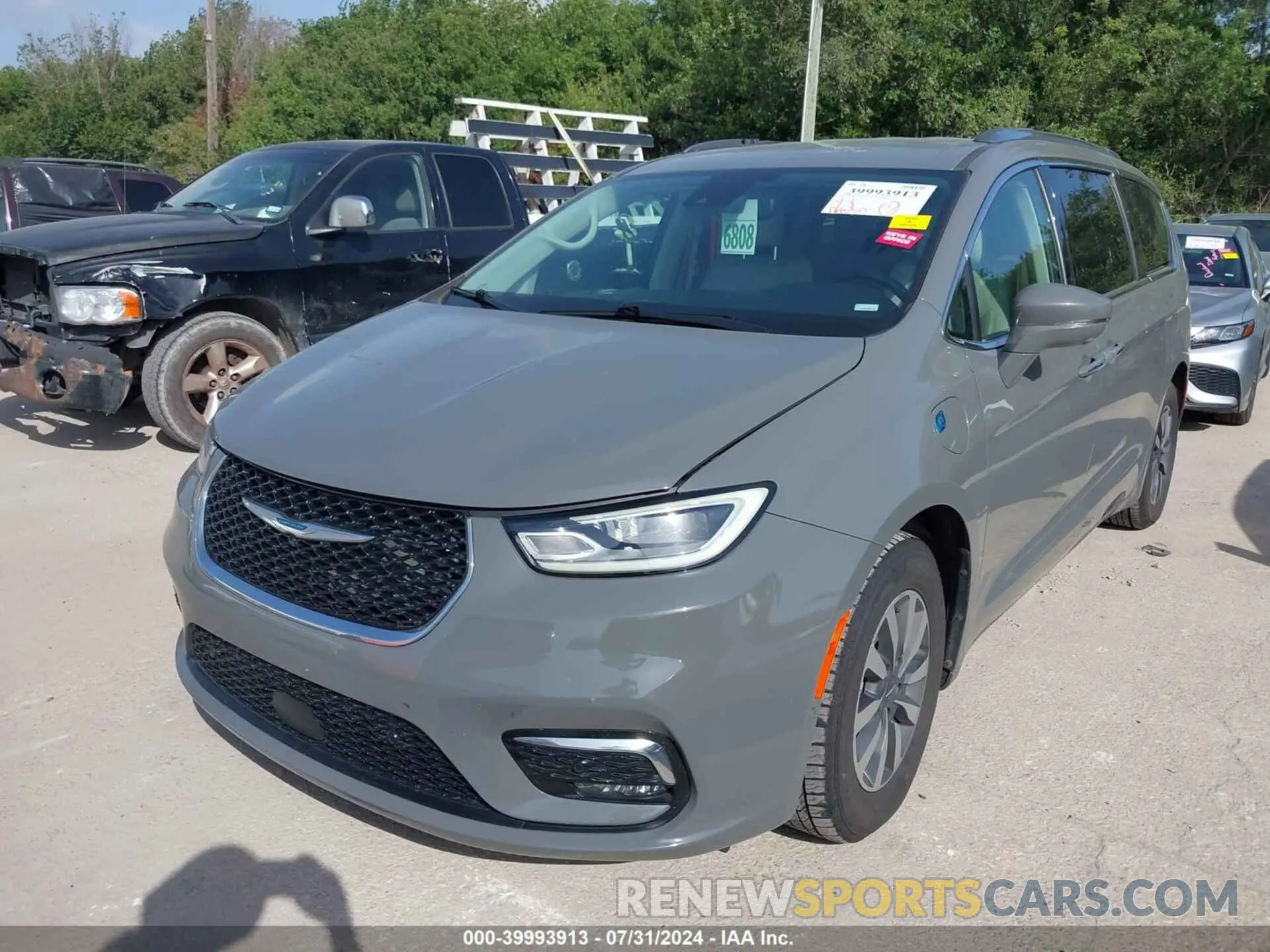 2 fotografías del automóvil dañado 2C4RC1L78MR596371 CHRYSLER PACIFICA HYBRID 2021