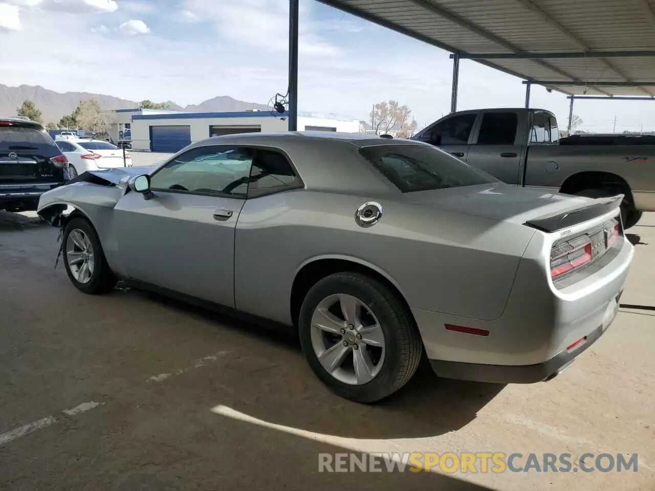 2 fotografías del automóvil dañado 2C3CDZAG6PH525754 DODGE CHALLENGER 2023