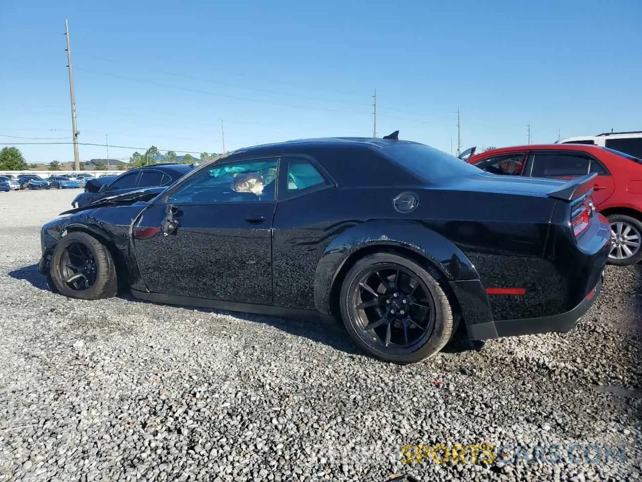 2 fotografías del automóvil dañado 2C3CDZC99PH520434 DODGE CHALLENGER 2023