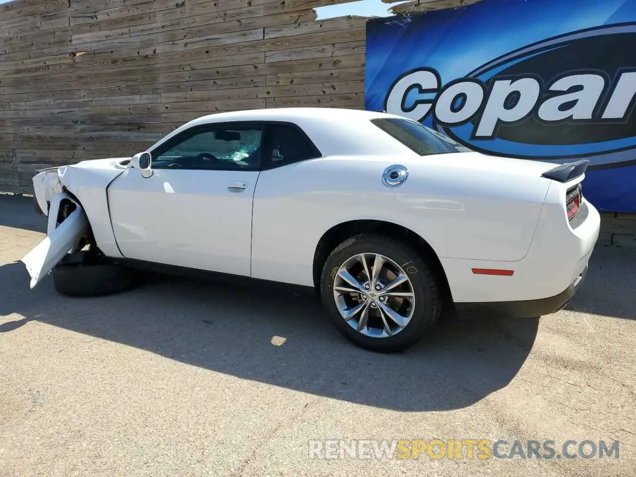 2 fotografías del automóvil dañado 2C3CDZGGXPH697065 DODGE CHALLENGER 2023