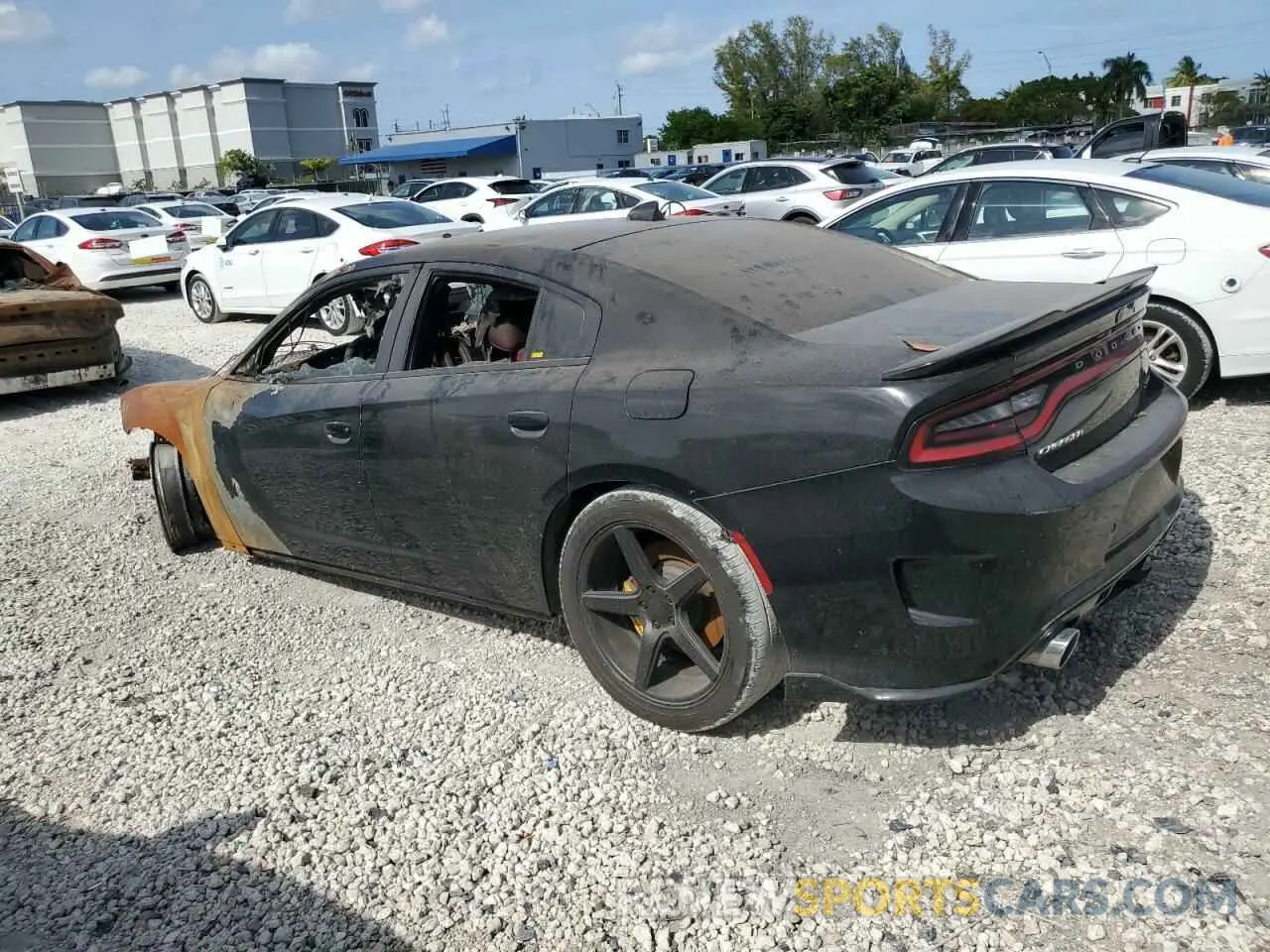 2 fotografías del automóvil dañado 2C3CDXL99KH671724 DODGE CHARGER 2019