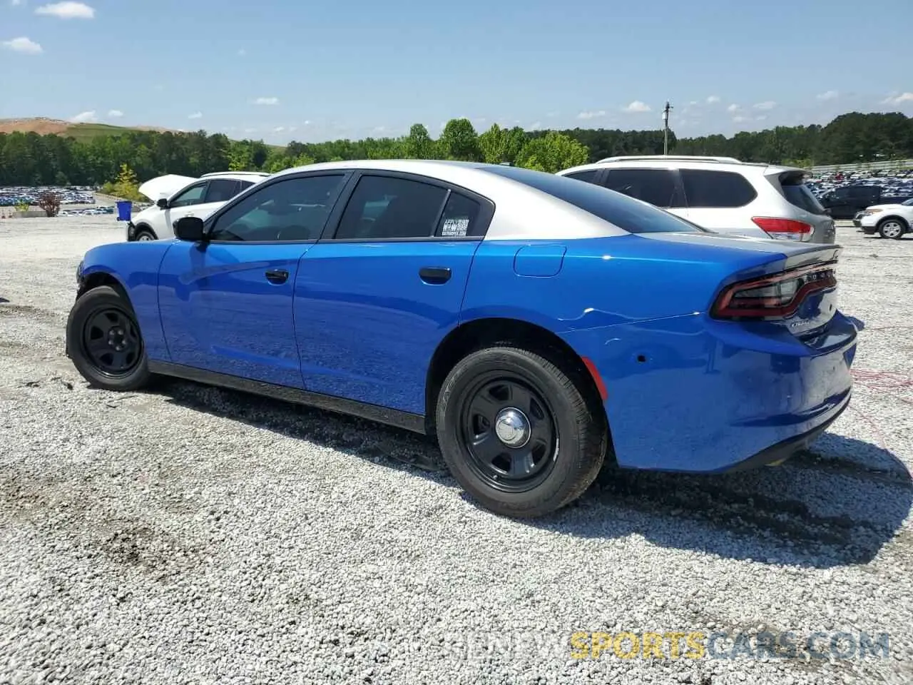 2 fotografías del automóvil dañado 2C3CDXAT0NH114011 DODGE CHARGER 2022