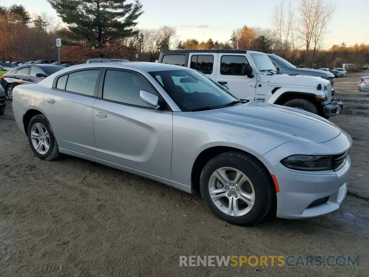4 fotografías del automóvil dañado 2C3CDXBG0NH126760 DODGE CHARGER 2022