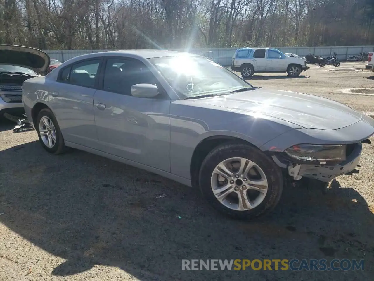 4 fotografías del automóvil dañado 2C3CDXBG1NH169326 DODGE CHARGER 2022