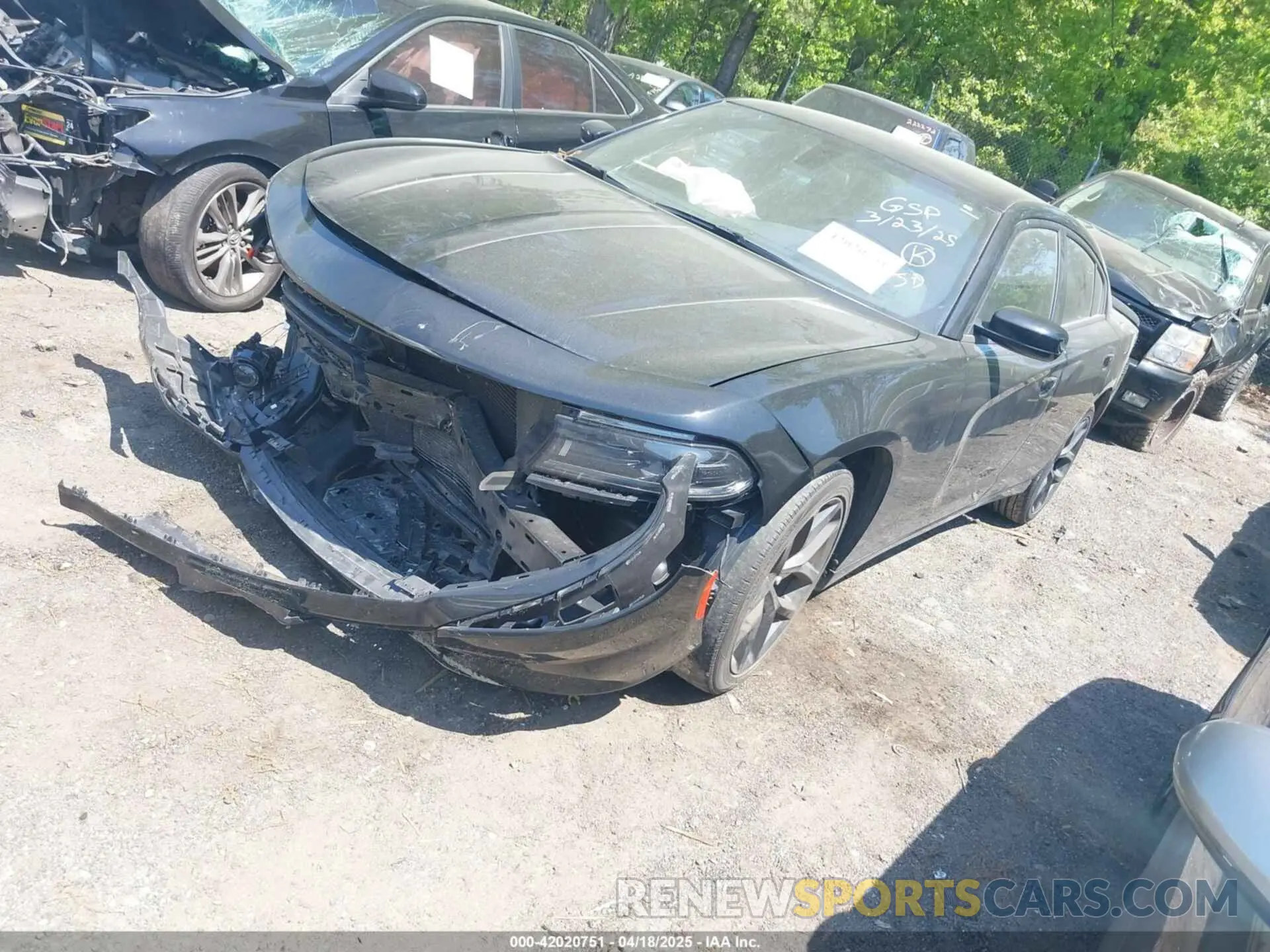 2 fotografías del automóvil dañado 2C3CDXBG2NH141227 DODGE CHARGER 2022
