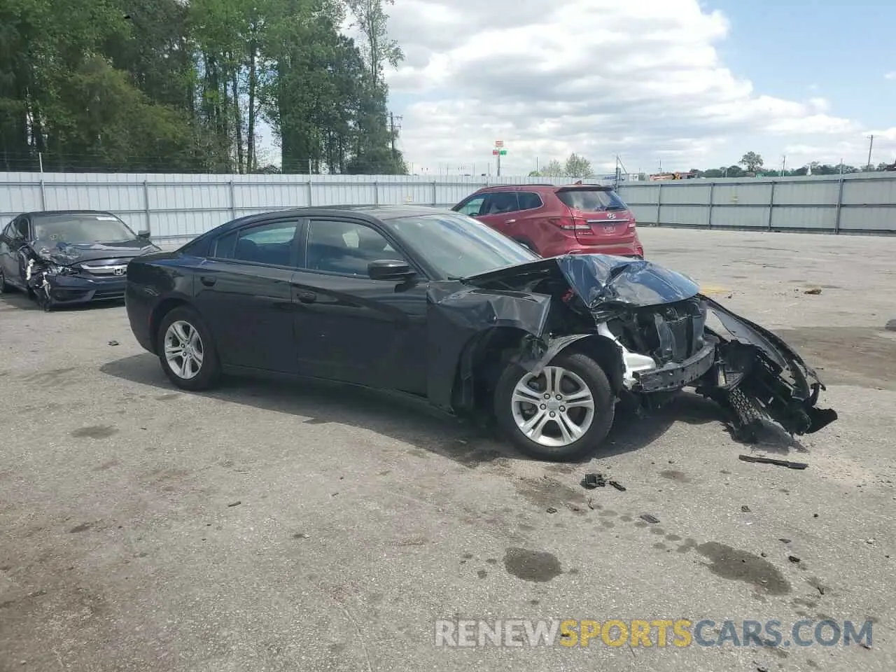 4 fotografías del automóvil dañado 2C3CDXBG2NH200616 DODGE CHARGER 2022