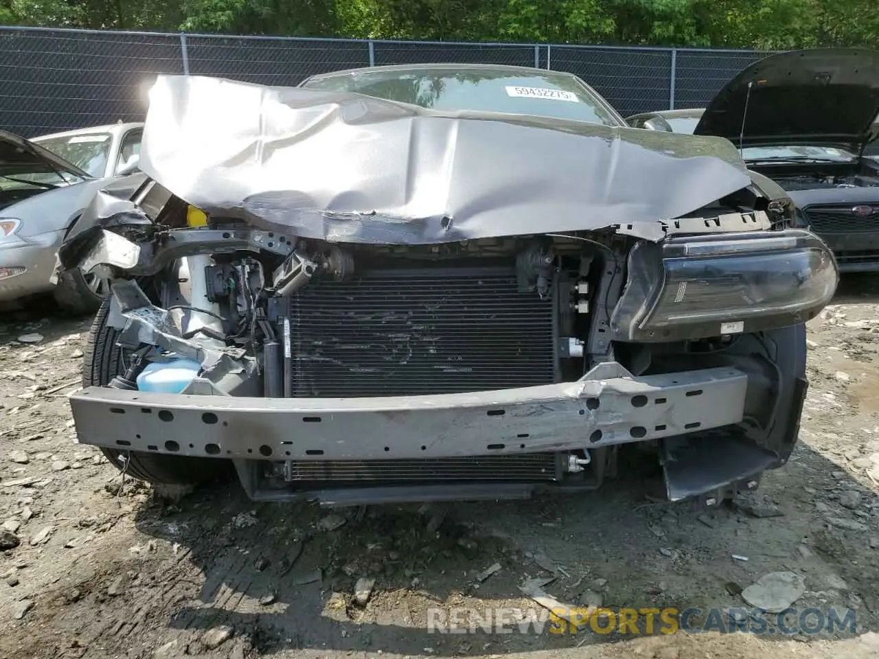 5 fotografías del automóvil dañado 2C3CDXBG5NH234629 DODGE CHARGER 2022