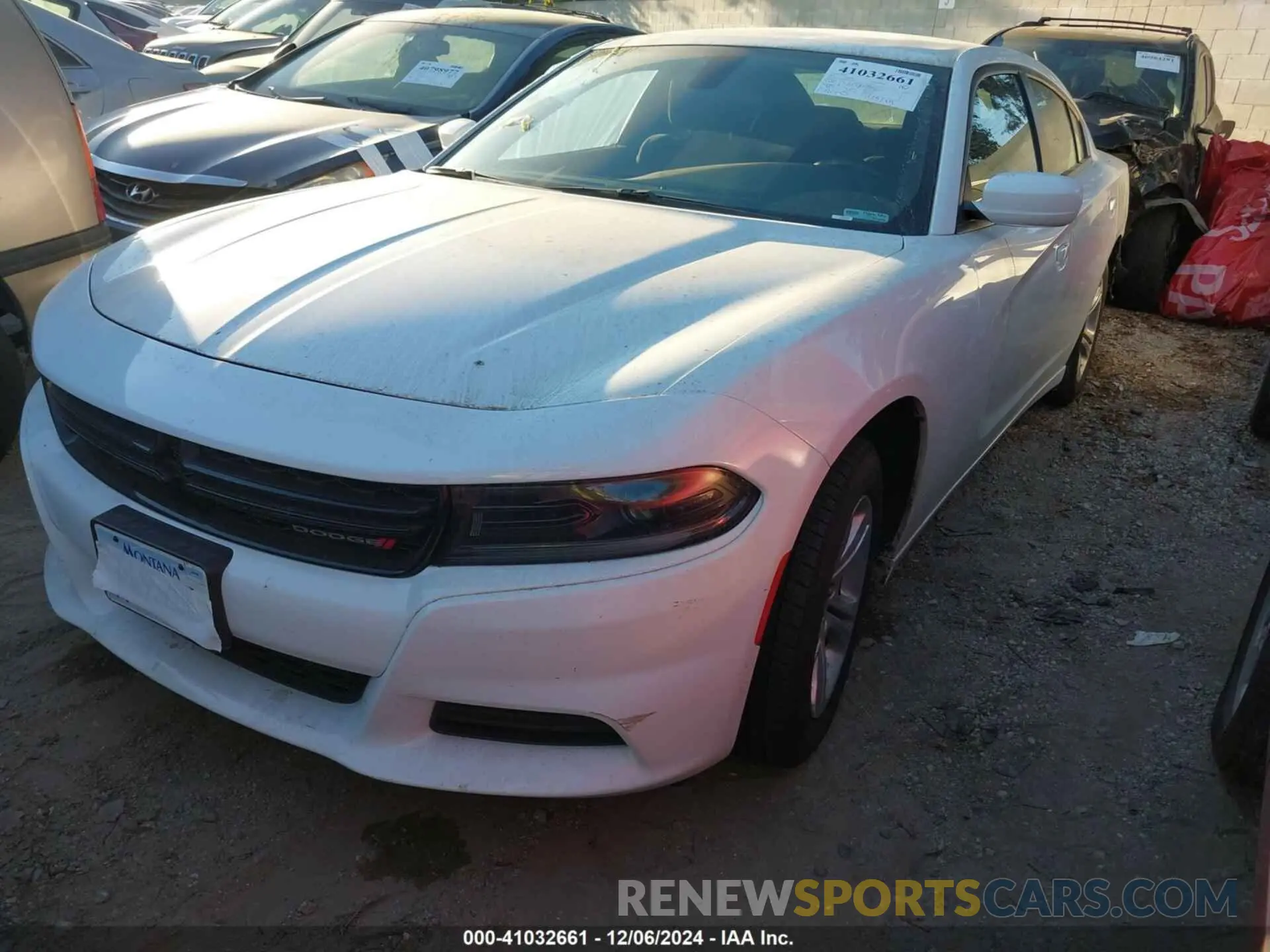 2 fotografías del automóvil dañado 2C3CDXBG7NH220053 DODGE CHARGER 2022