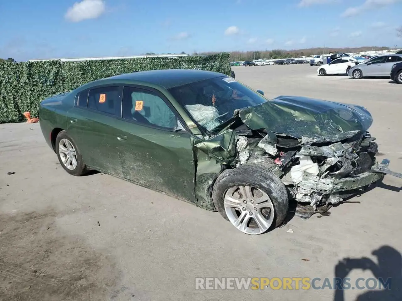 4 fotografías del automóvil dañado 2C3CDXBG8NH243843 DODGE CHARGER 2022