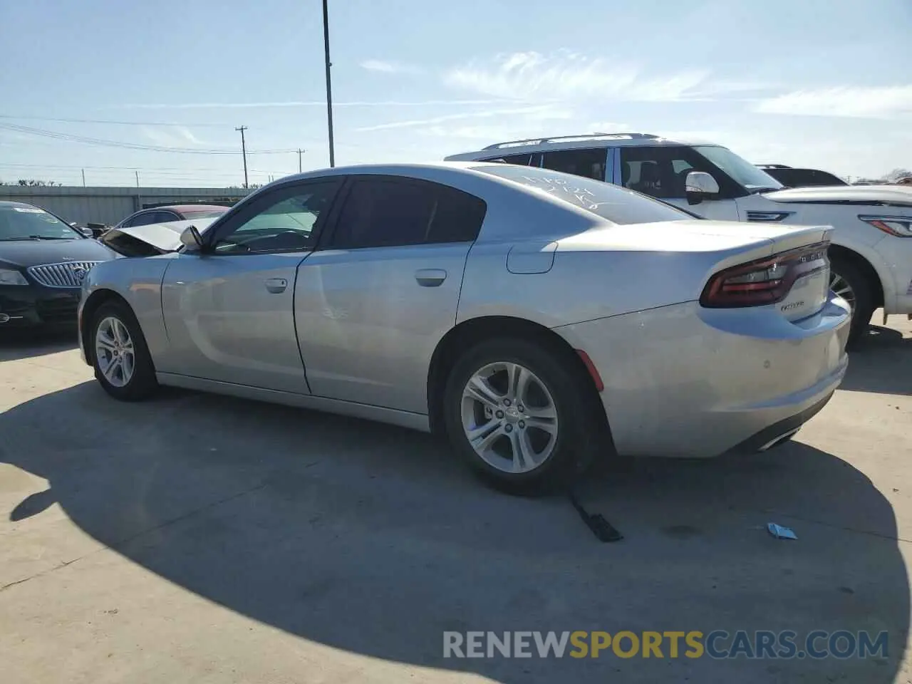 2 fotografías del automóvil dañado 2C3CDXBG9NH169297 DODGE CHARGER 2022