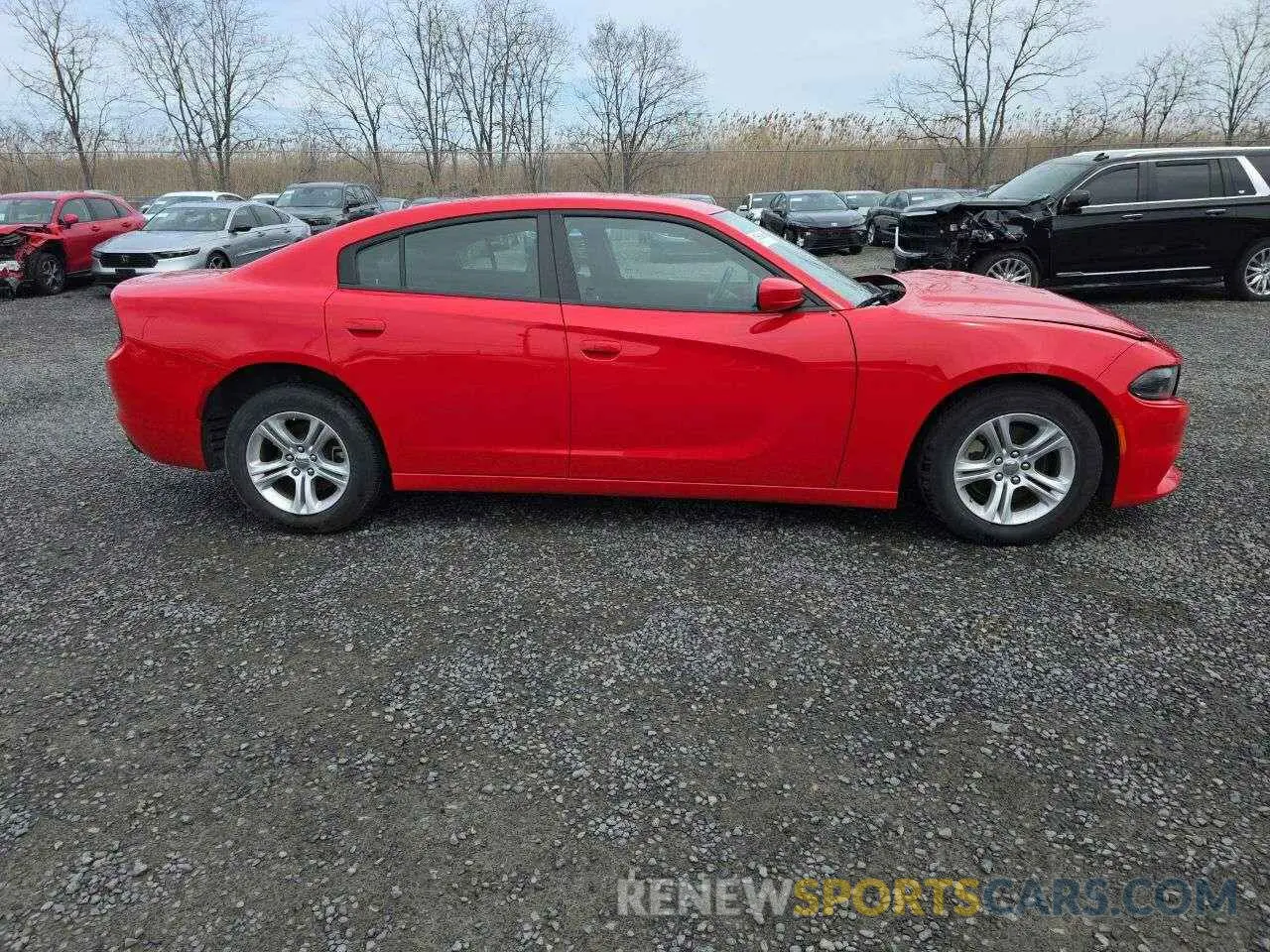 14 fotografías del automóvil dañado 2C3CDXBG9NH258951 DODGE CHARGER 2022