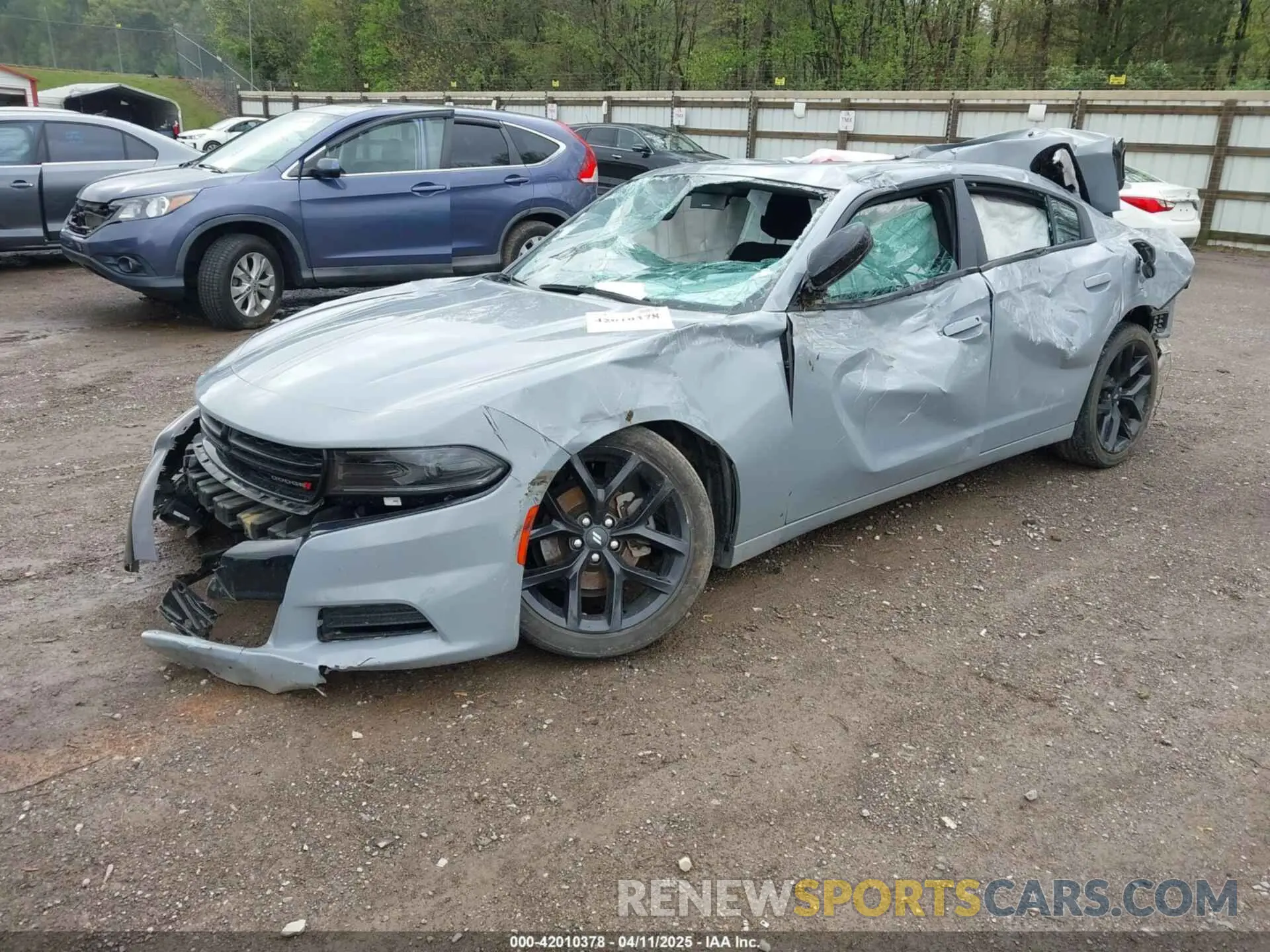 2 fotografías del automóvil dañado 2C3CDXBGXNH145896 DODGE CHARGER 2022