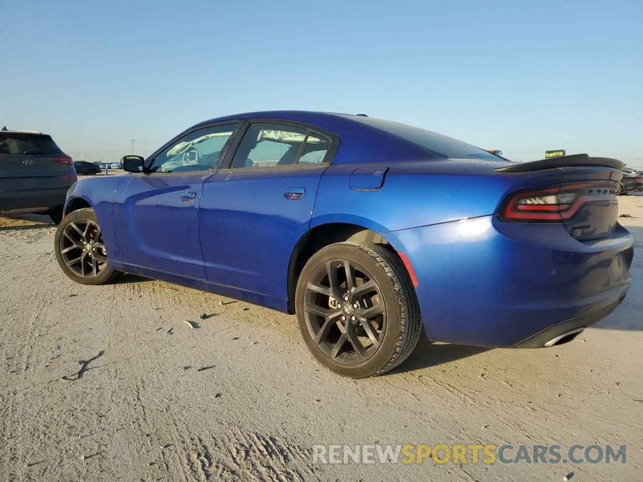 2 fotografías del automóvil dañado 2C3CDXBGXNH205983 DODGE CHARGER 2022