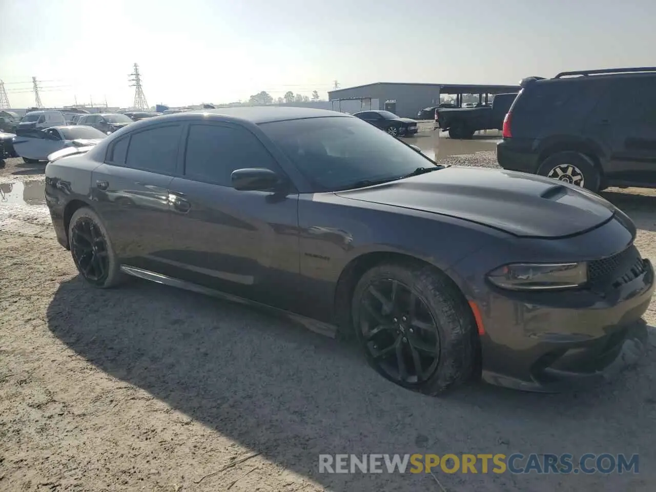4 fotografías del automóvil dañado 2C3CDXCT2NH114251 DODGE CHARGER 2022